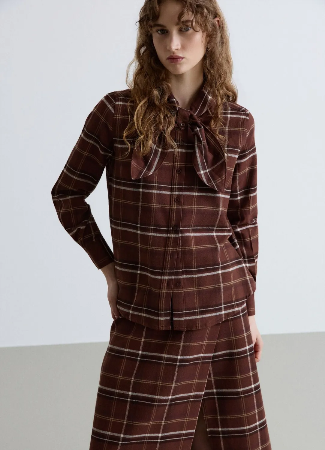 Calliope chemise à carreaux noeud femme manches longues