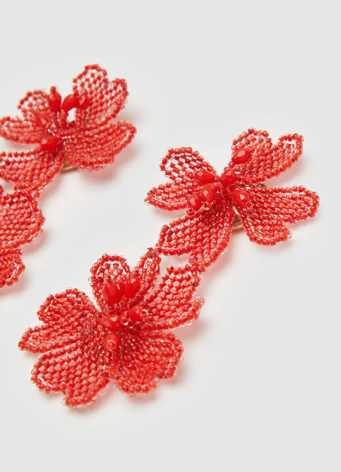Calliope boucles d'oreilles pendantes fleurs en perles TU