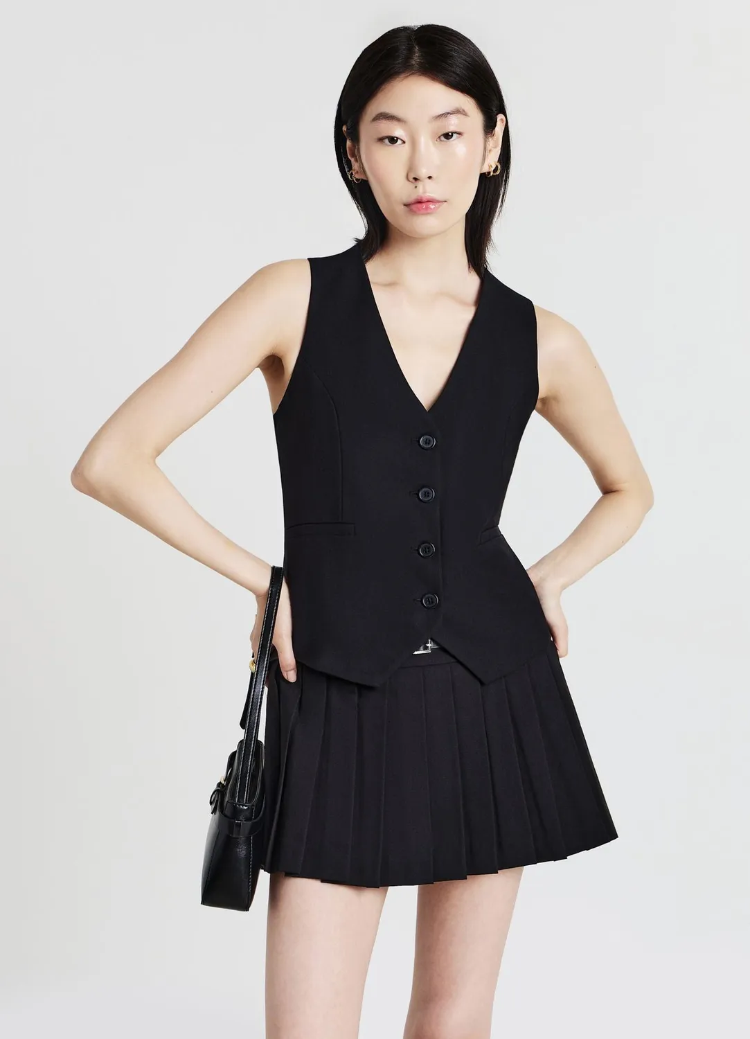Calliope Plissée jupe-short femme plis ceinture
