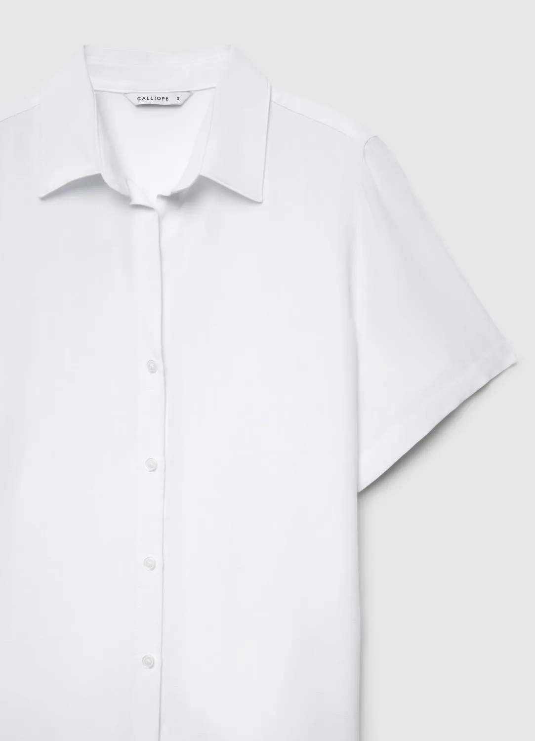 Calliope Chemise manches courtes femme unie