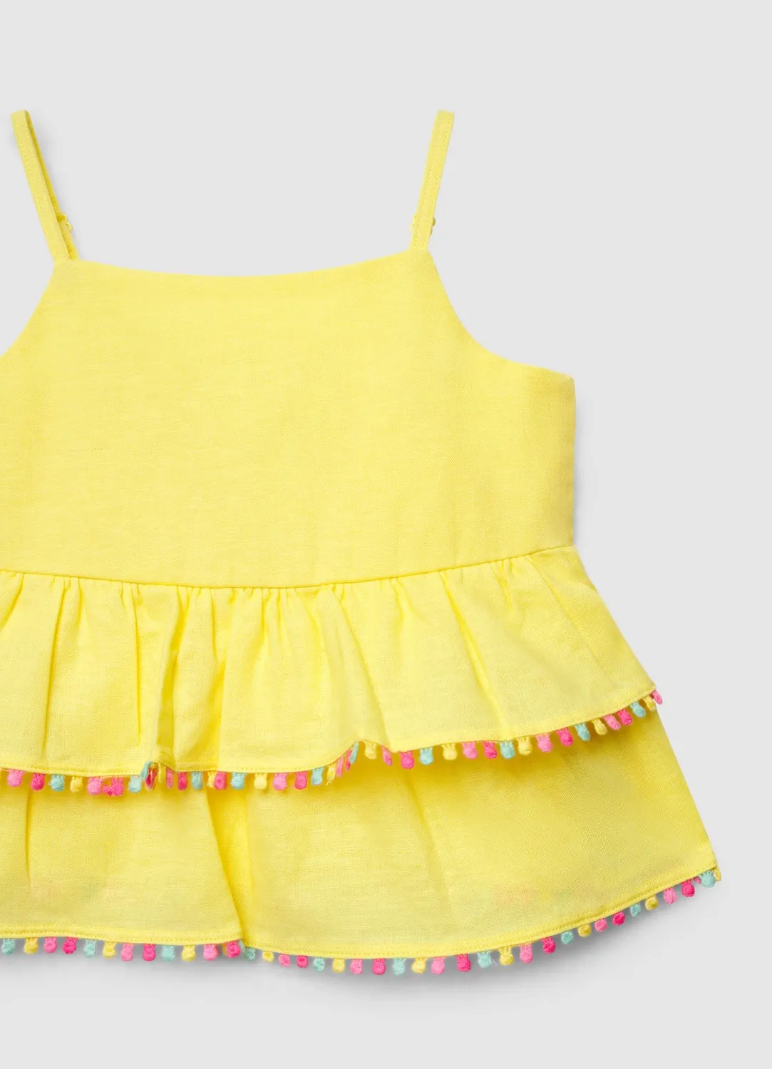 Calliope top fille volants pompons uni