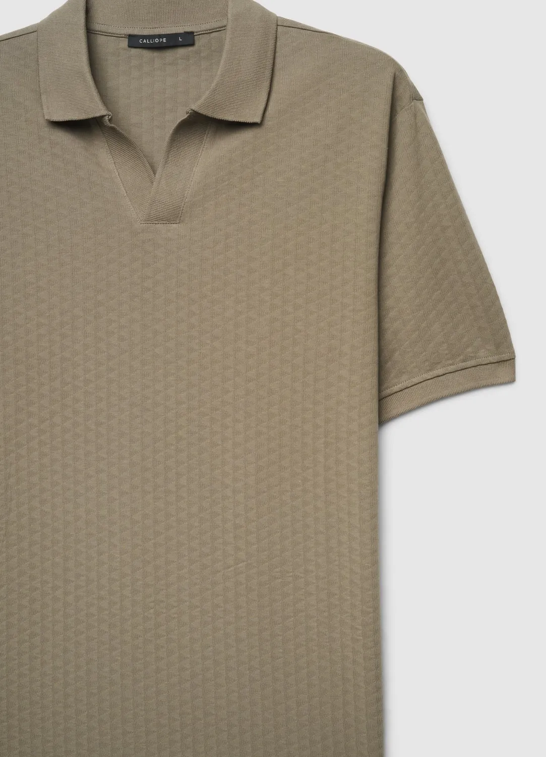 Calliope polo homme col ouvert jacquard uni