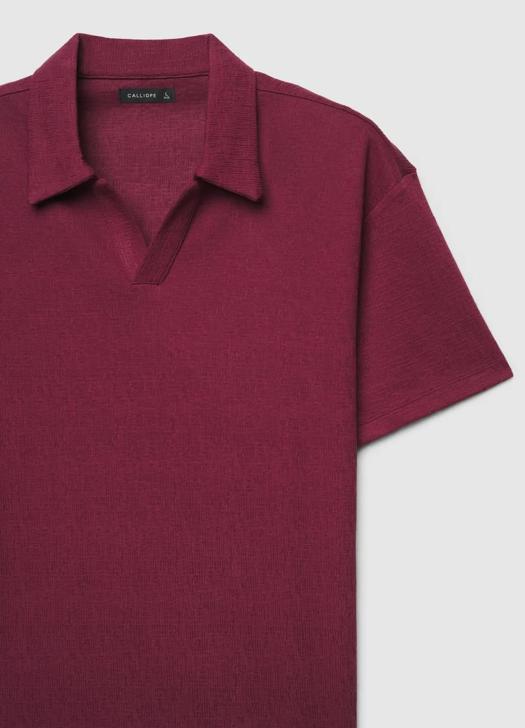 Calliope polo homme gaufré uni col V sans boutons