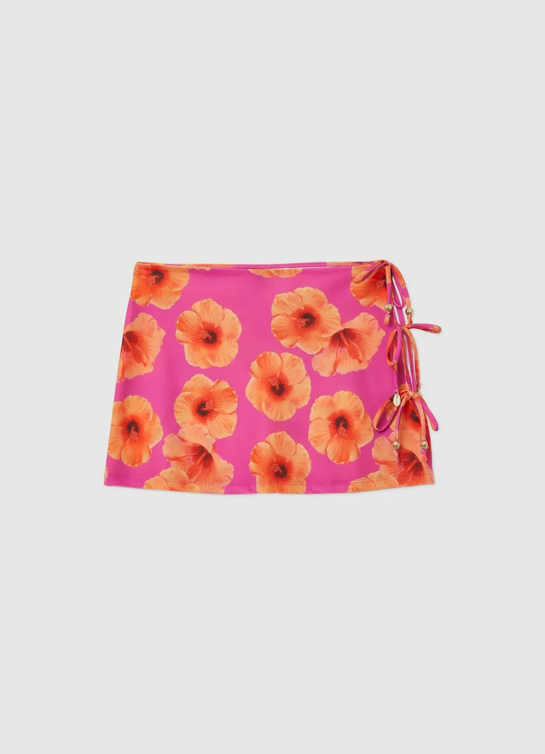 Calliope mini-jupe fleurs nouée plage femme