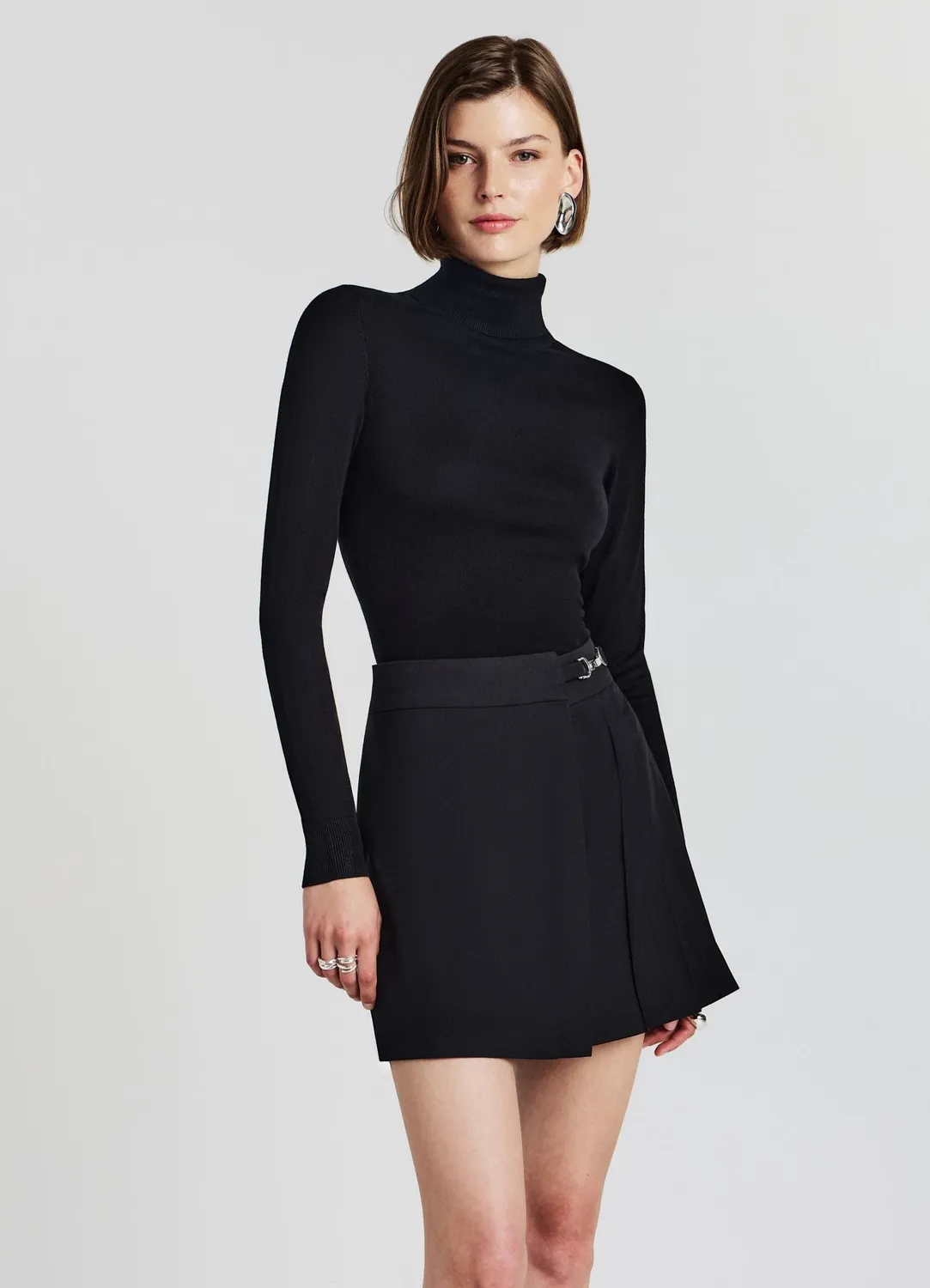 Calliope jupe-short femme plissée portefeuille unie