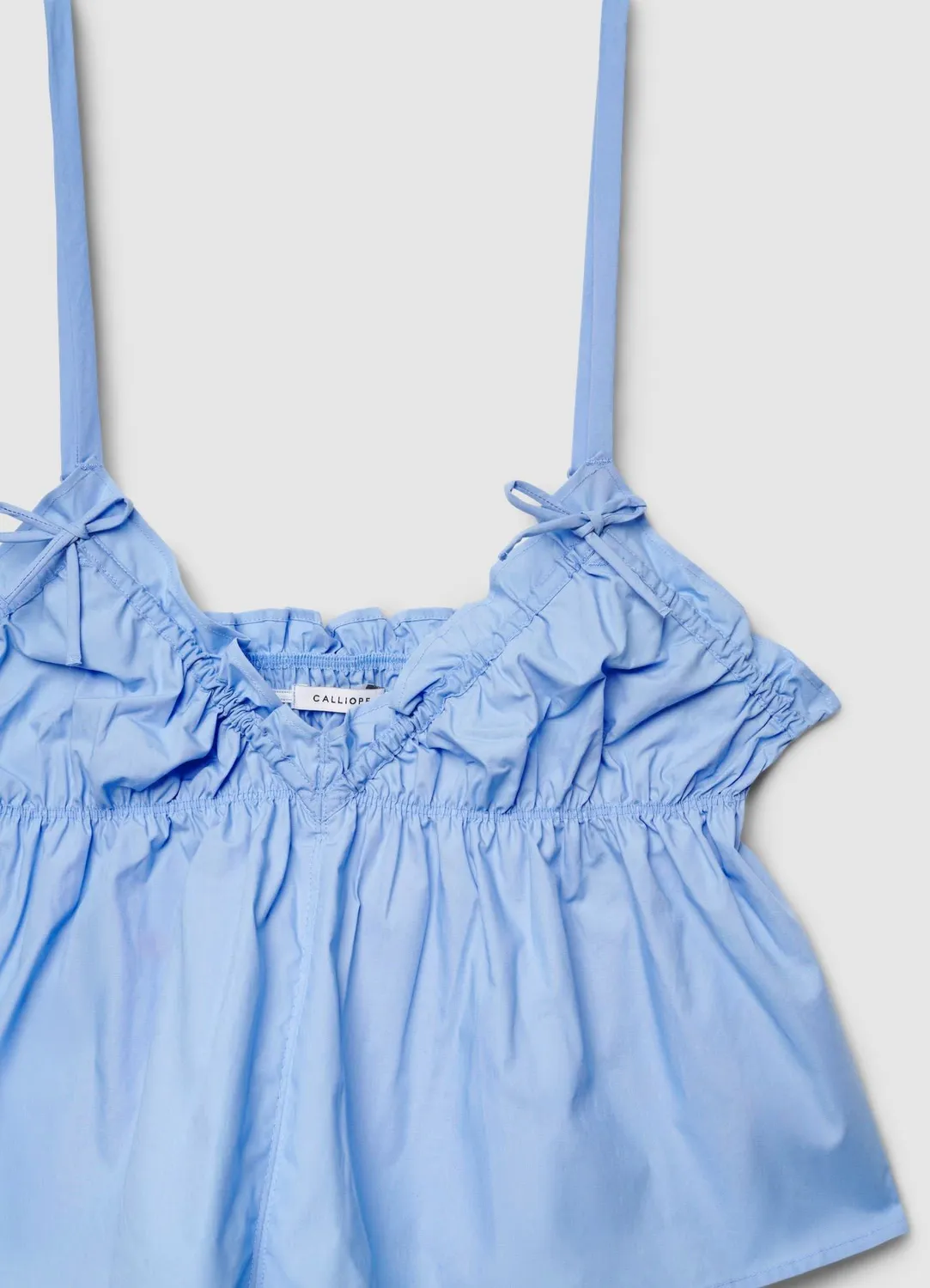 Calliope top femme bretelles col V volants
