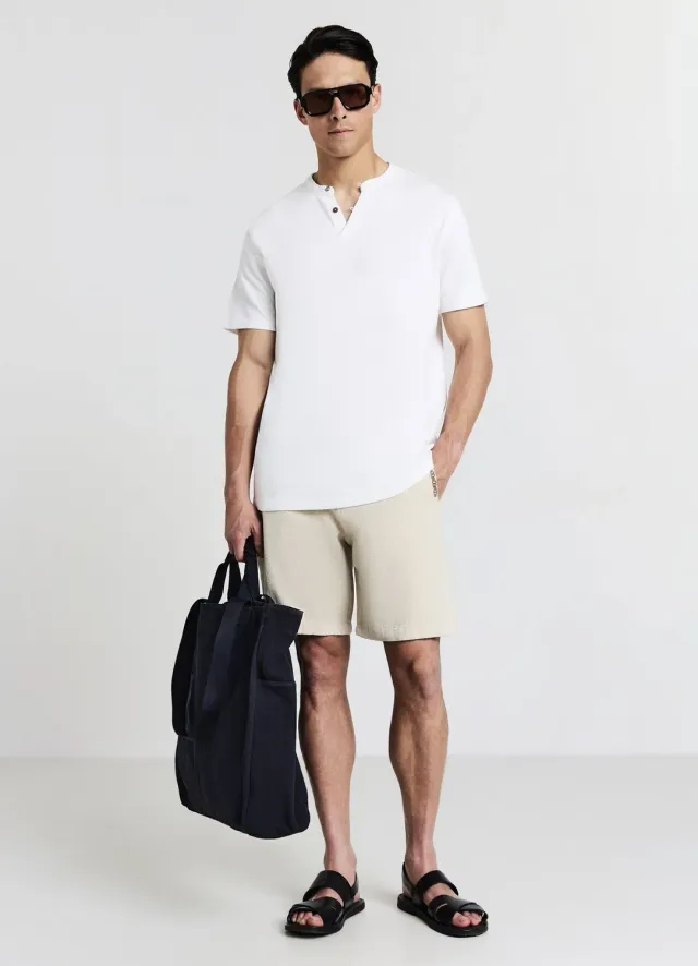 Calliope short chino homme cordon broderie poches