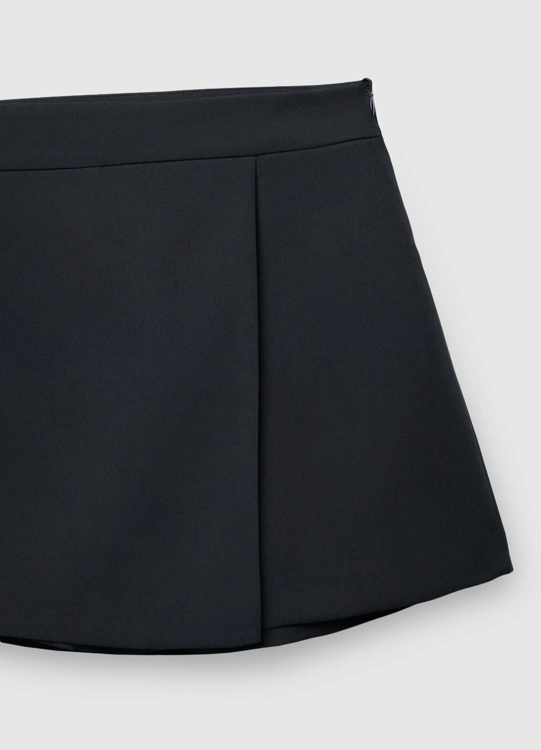 Calliope jupe-short unie femme zip latéral