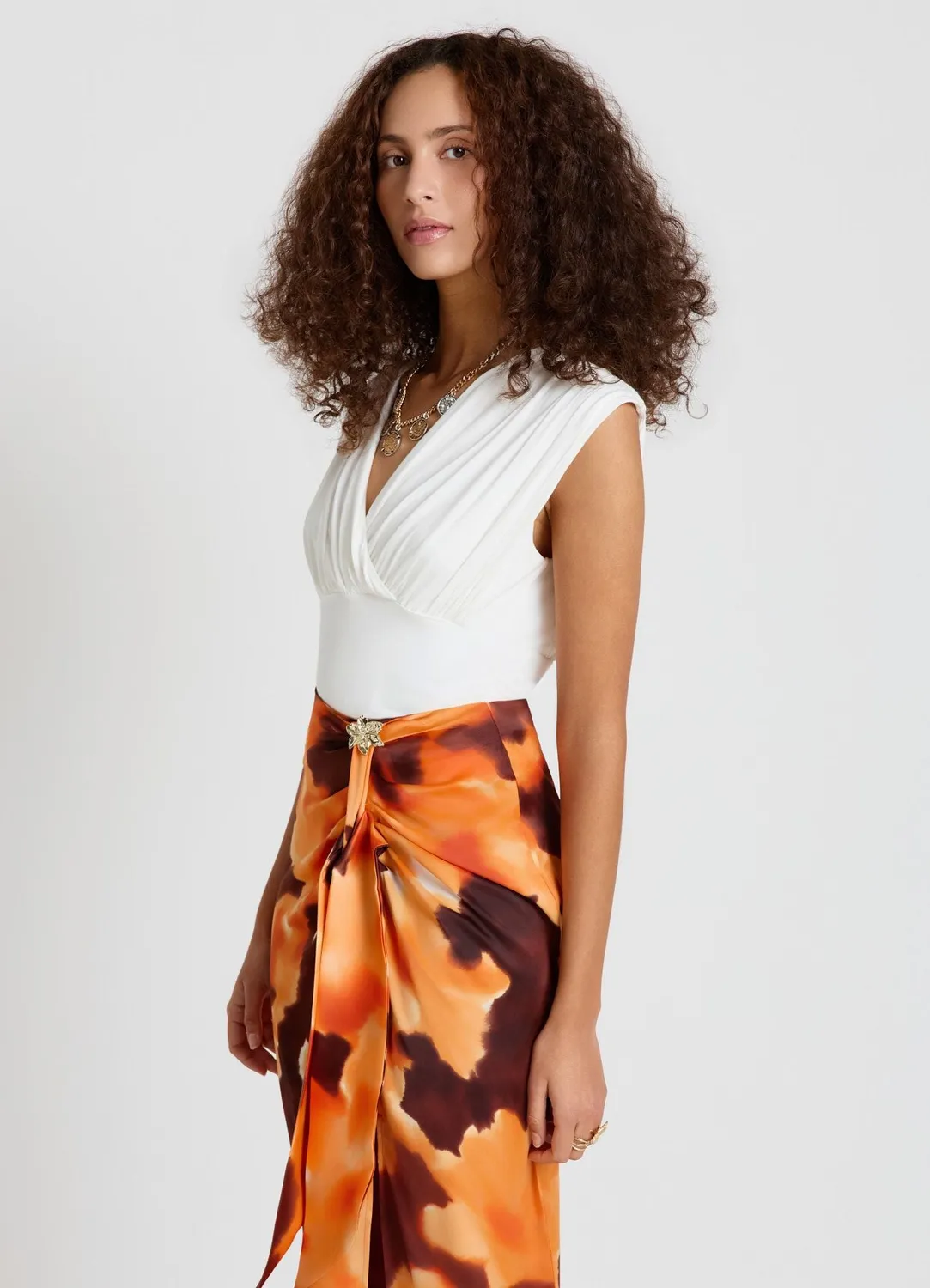 Calliope Top croise drape sans manches femme uni