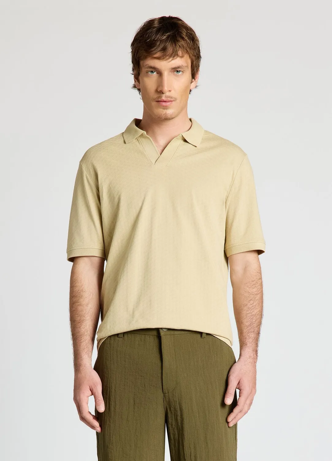 Calliope polo homme col ouvert jacquard uni