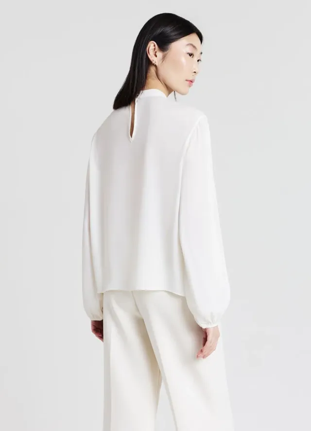 Calliope blouse à volants manches longues femme