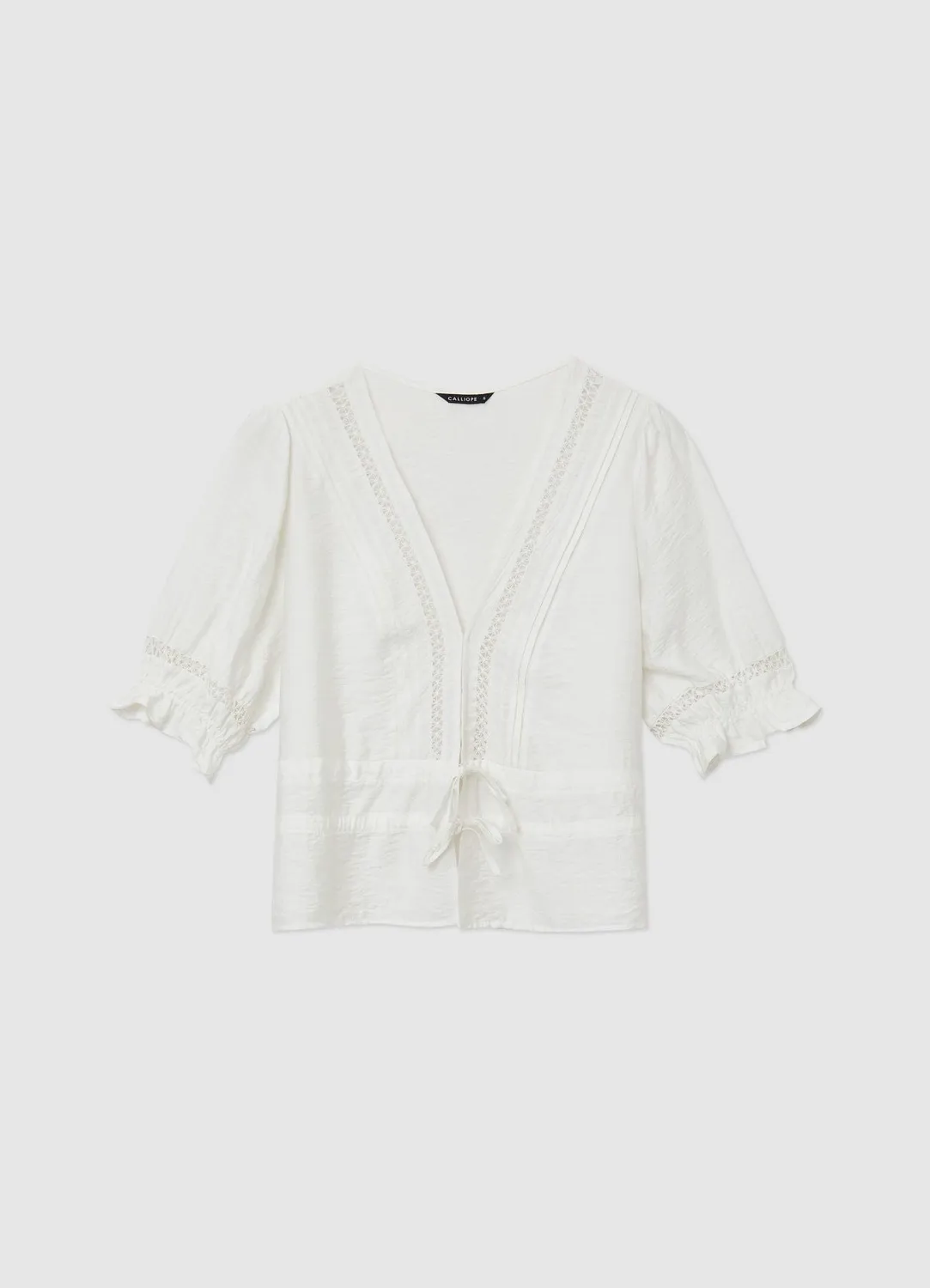 Calliope blouse broderie ajourée femme col V