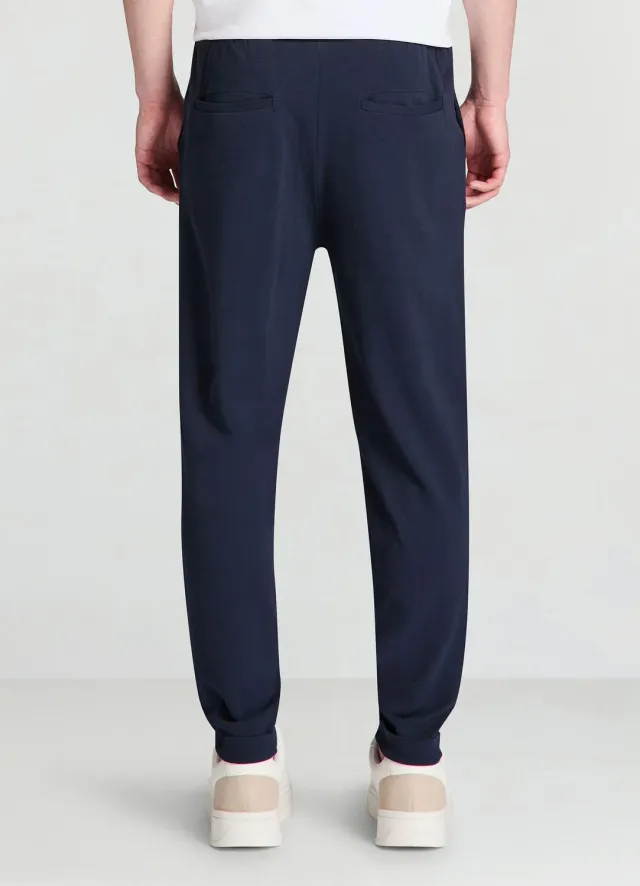 Calliope pantalon jogging piqué homme uni