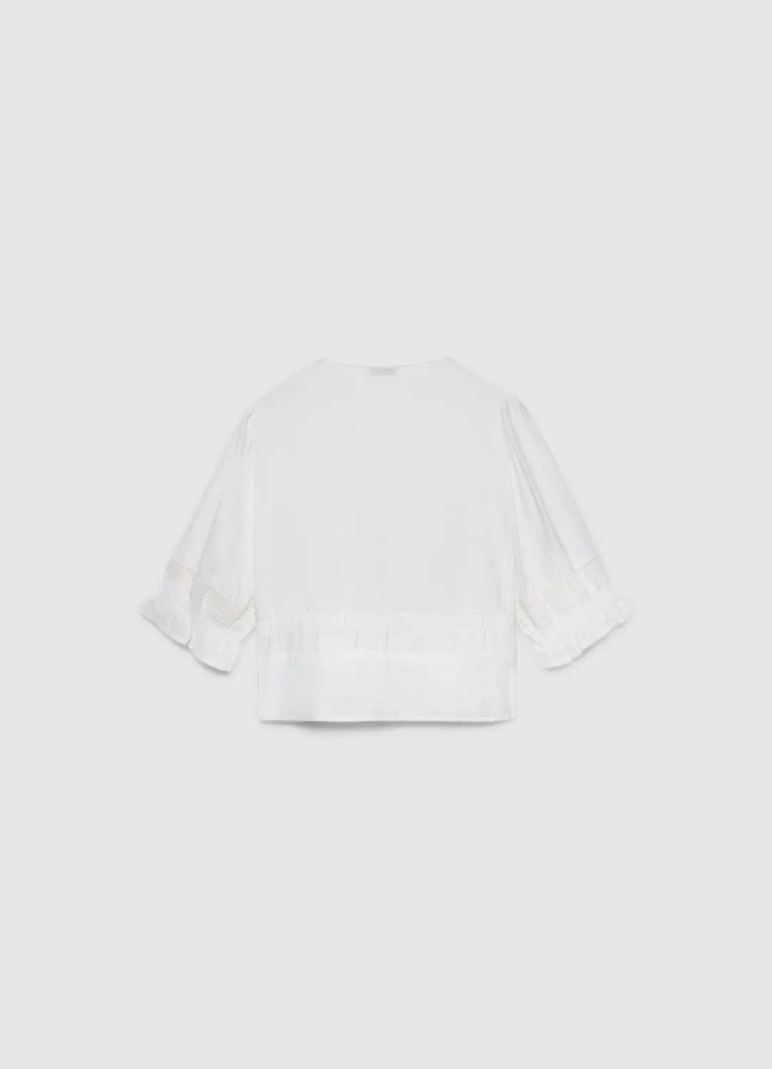Calliope blouse ajourée col V laçage femme