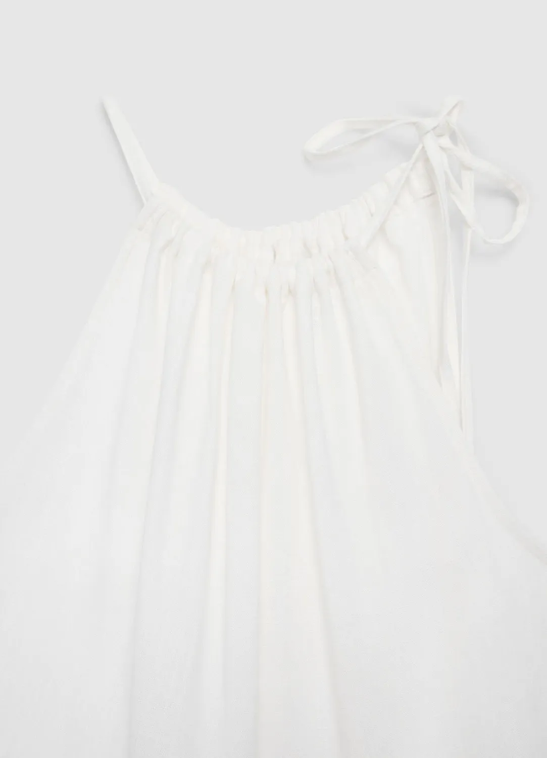 Calliope top femme col smocké à volant uni