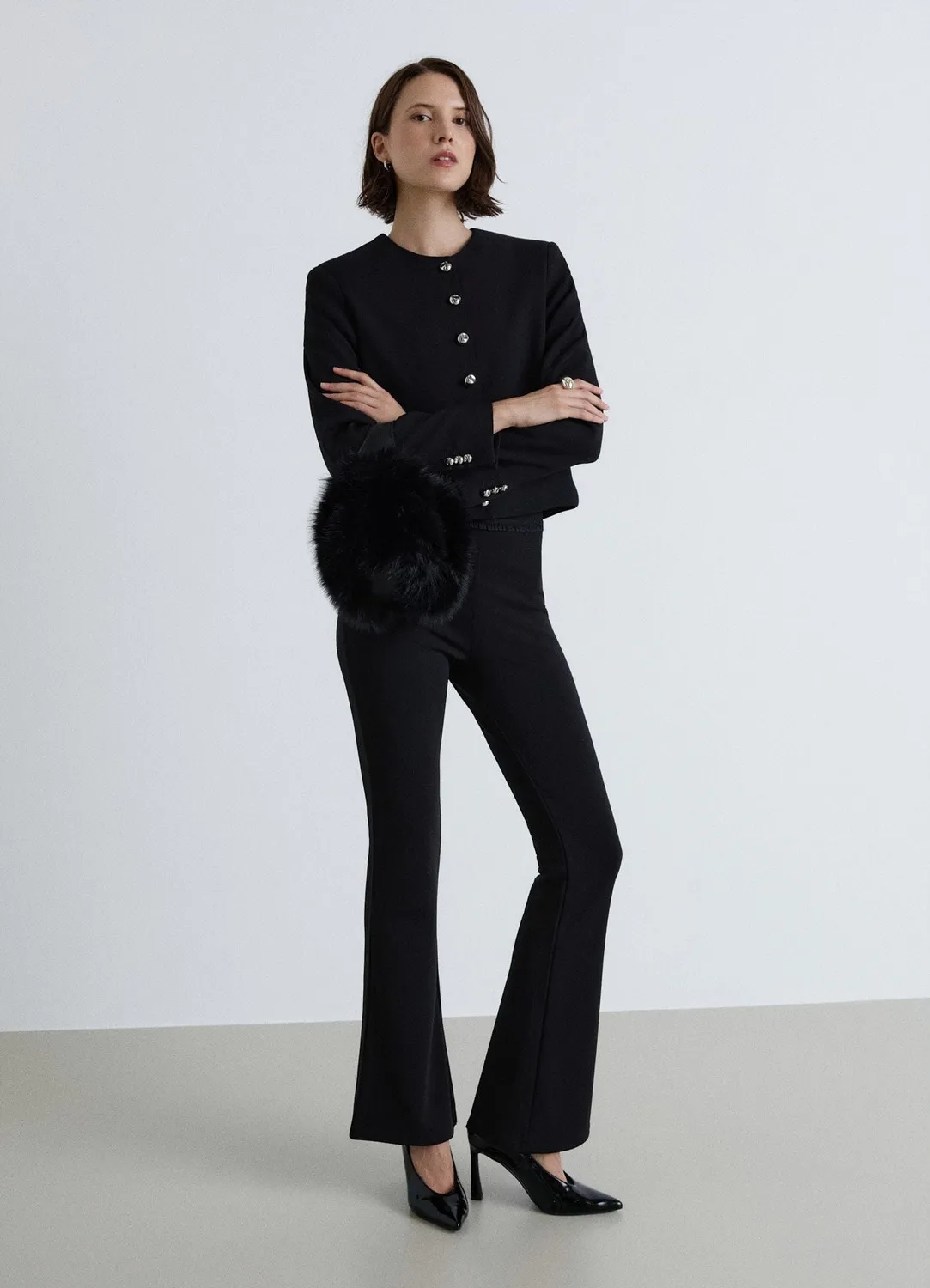 Calliope veste courte sans col boutonnée unie