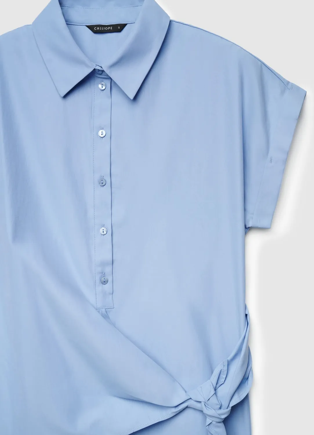 Calliope chemise nœud côté manches courtes unie