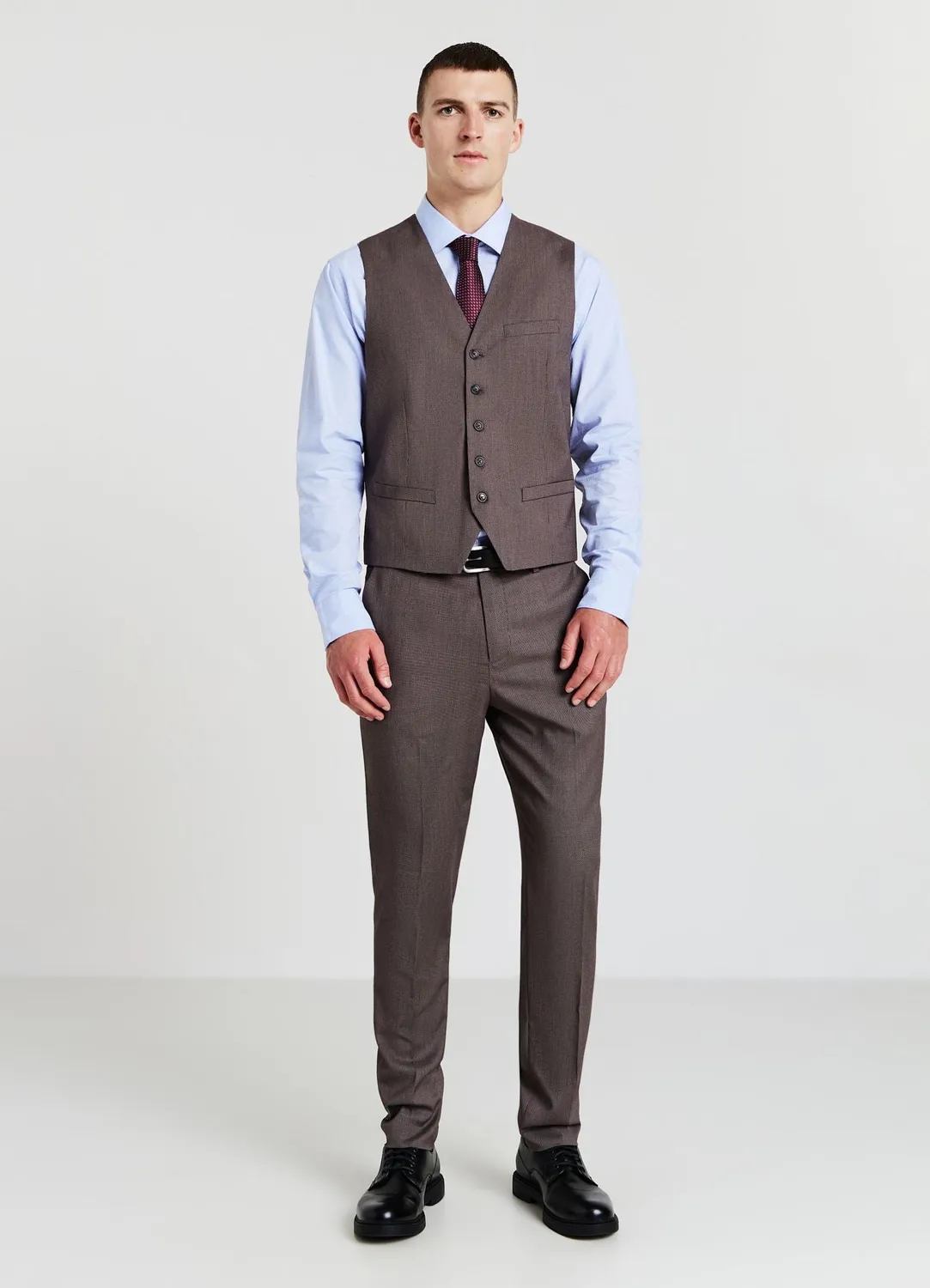 Calliope Atelier elegante tinta unita gilet homme col V