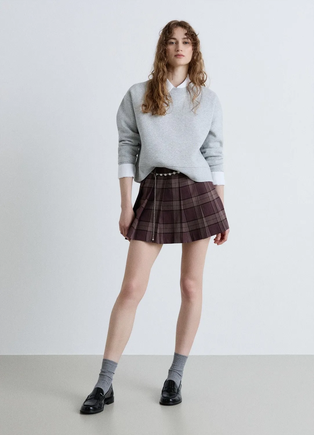 Calliope jupe-short à carreaux plissée femme