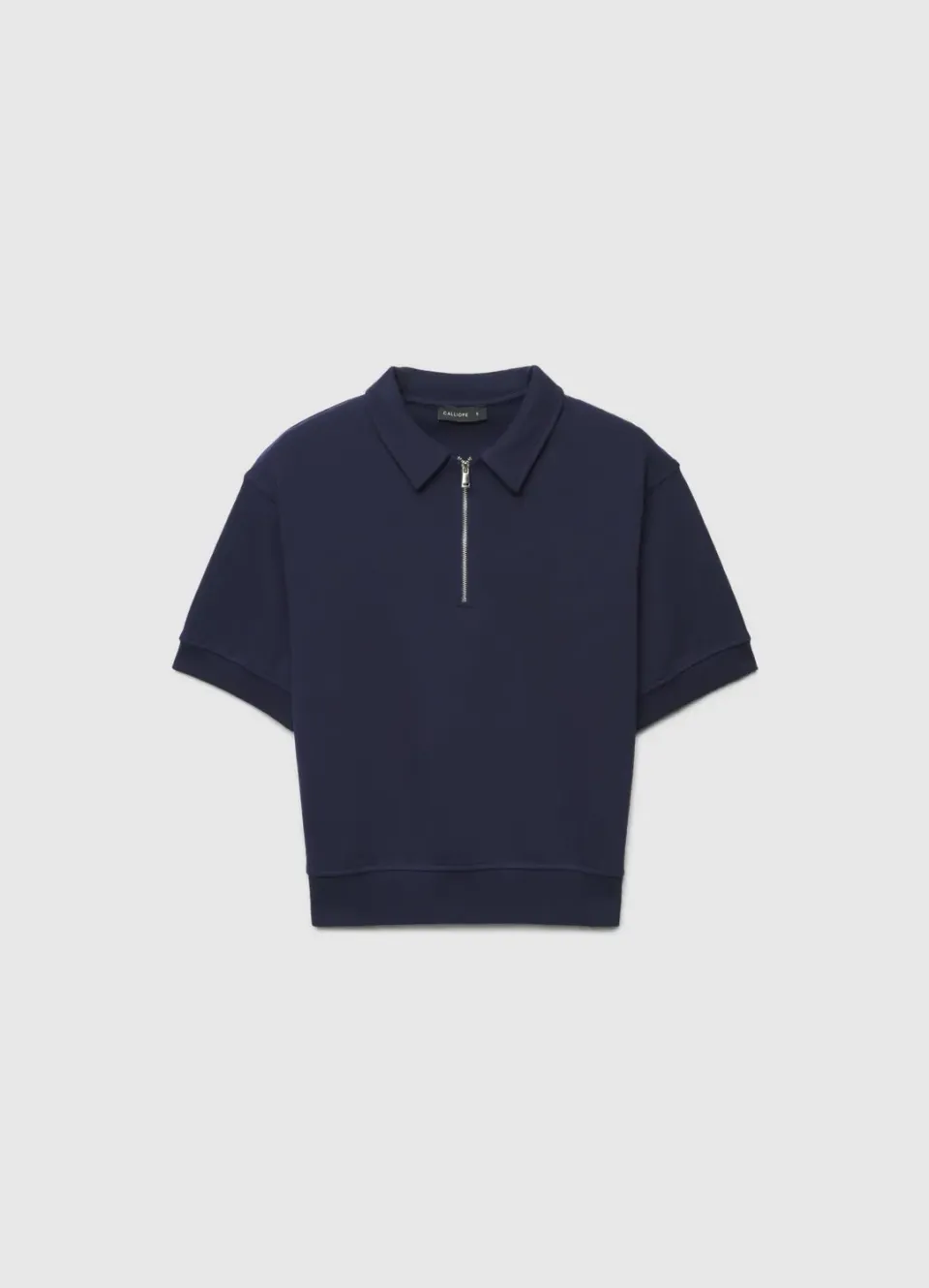 Calliope polo zip femme manches courtes uni