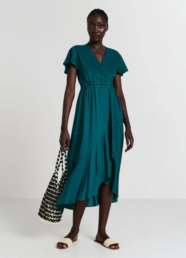 Calliope Atelier robe croisée longue à volants