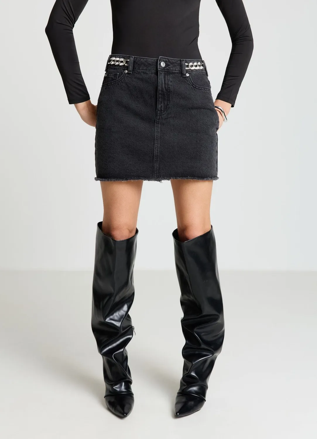 Calliope minijupe denim chaîne strass femme