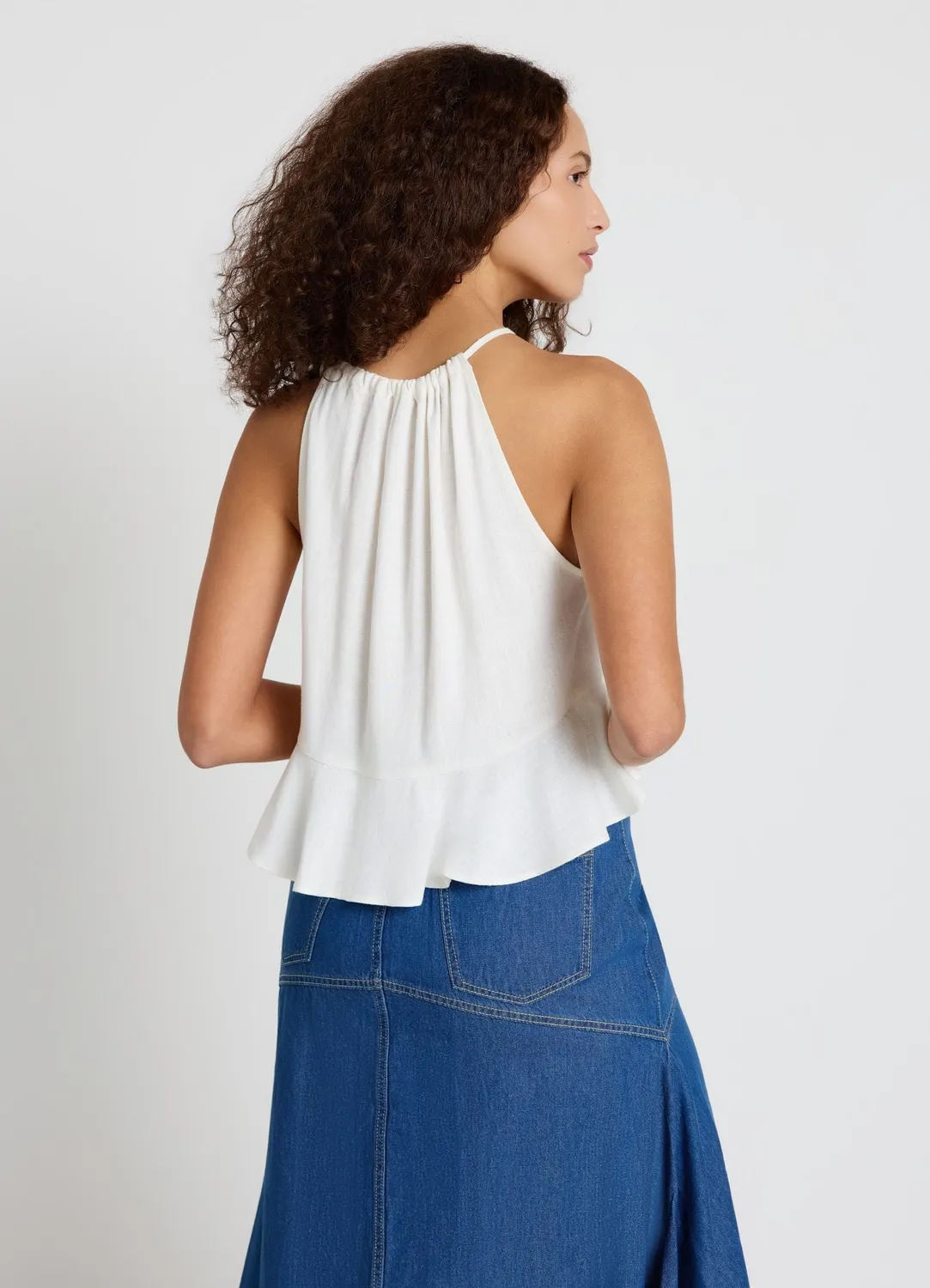 Calliope top femme col smocké à volant uni