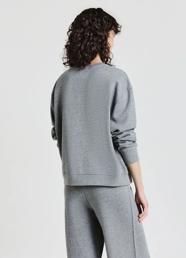 Calliope sweat femme col rond uni effet luminescent