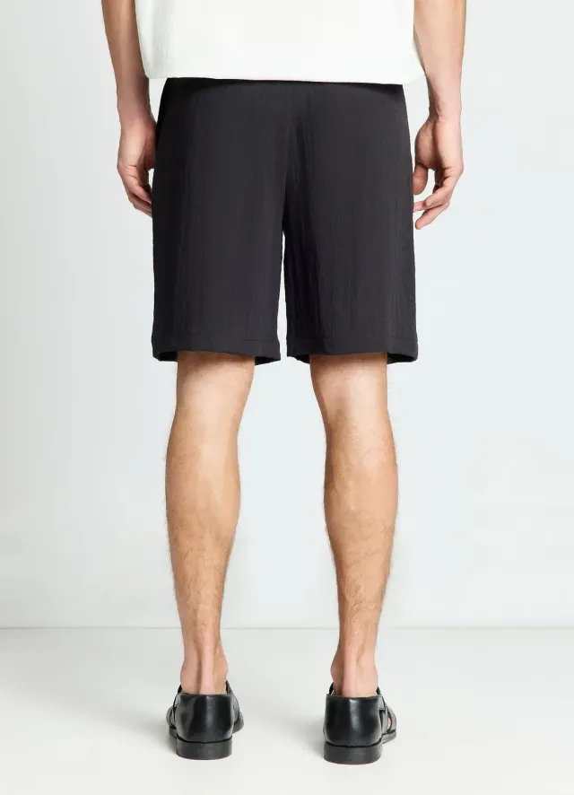 Calliope bermuda chino froissé uni homme