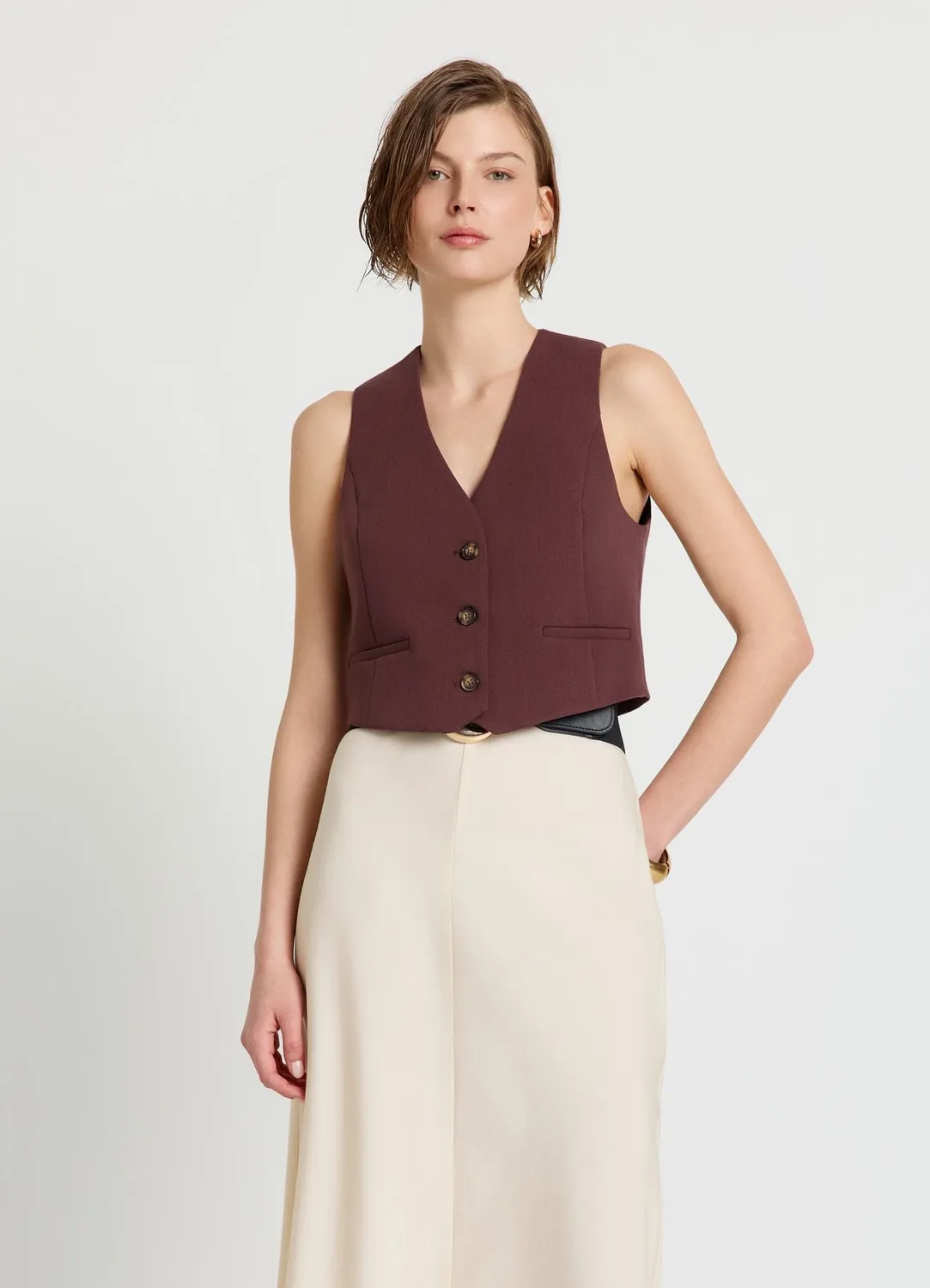 Calliope Gilet court boutons col V femme uni