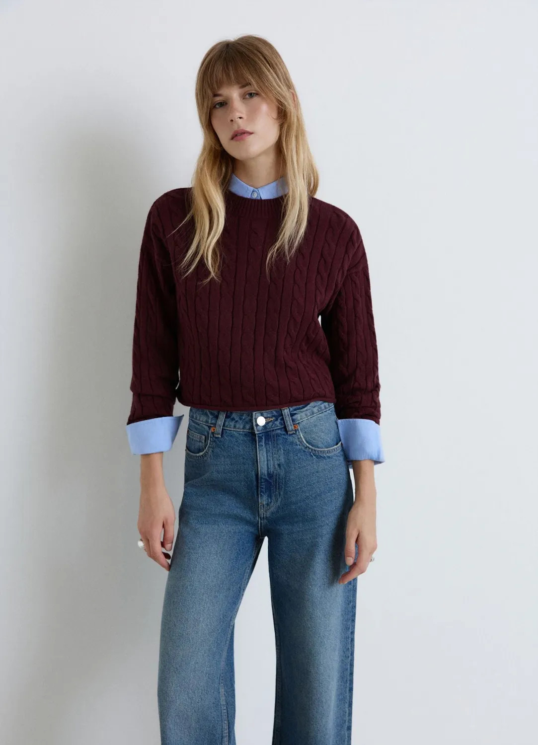 Calliope Pull crop torsadé col rond femme uni