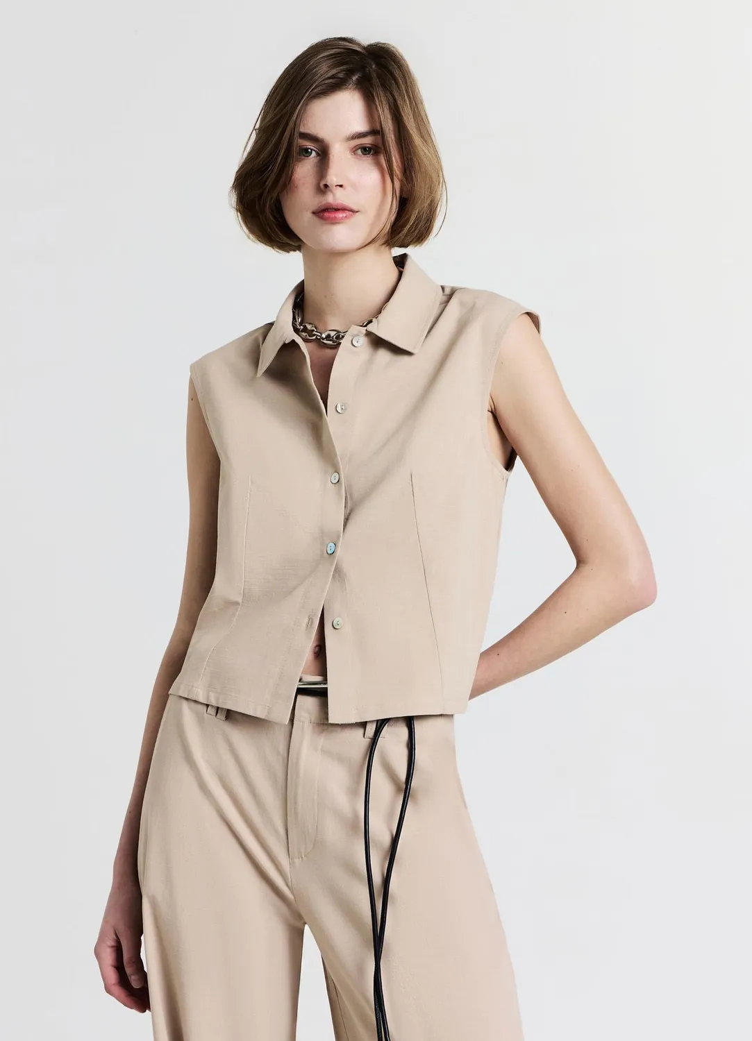 Calliope chemise sans manches col classique boucle
