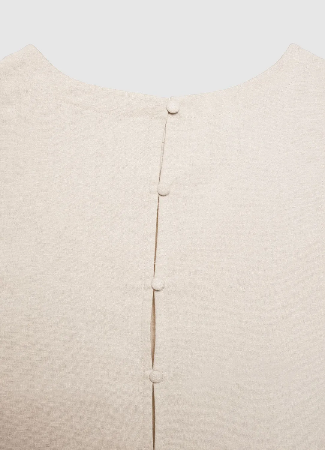 Calliope top court boutons dos femme sans manches