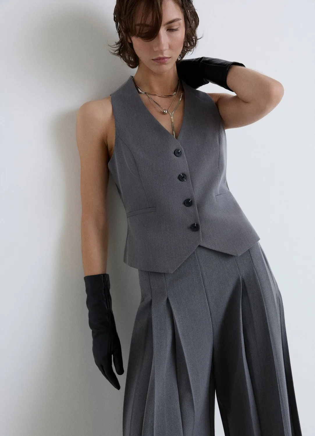 Calliope gilet uni boutons col V femme