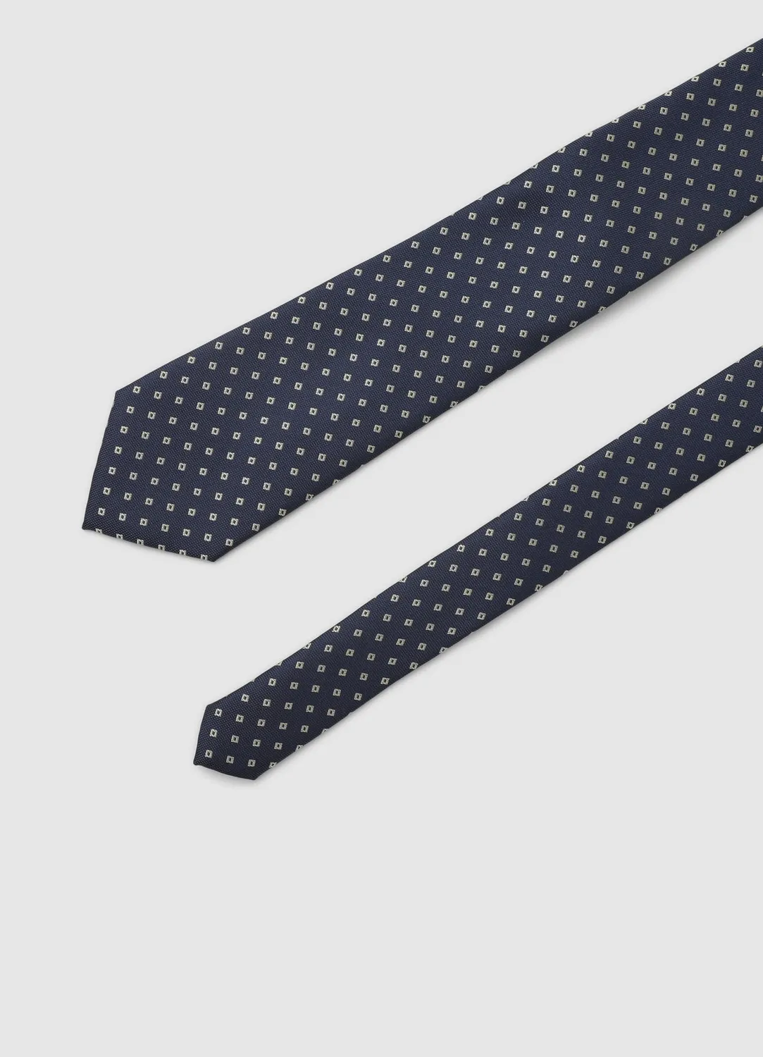 Calliope cravate homme micro-motifs géométriques