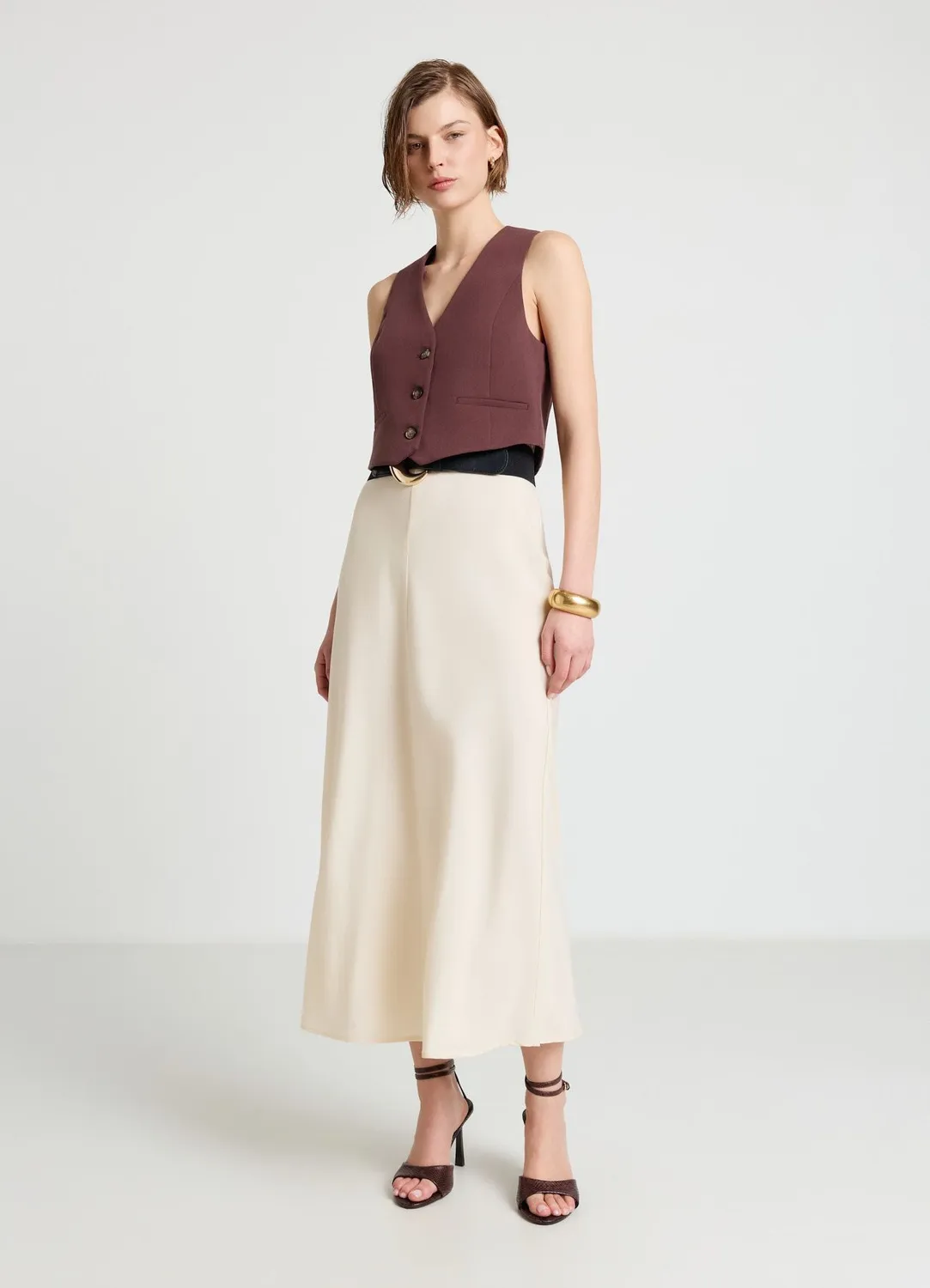 Calliope Gilet court boutons col V femme uni