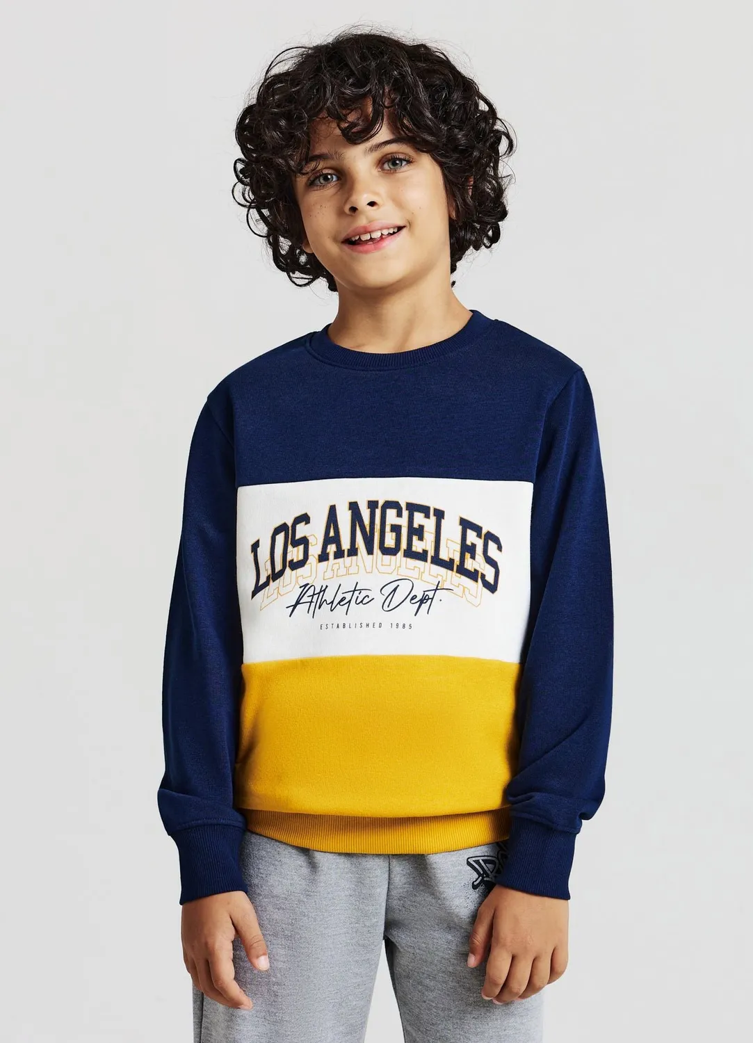 Calliope Sweat col rond garçon inscription blocs couleur