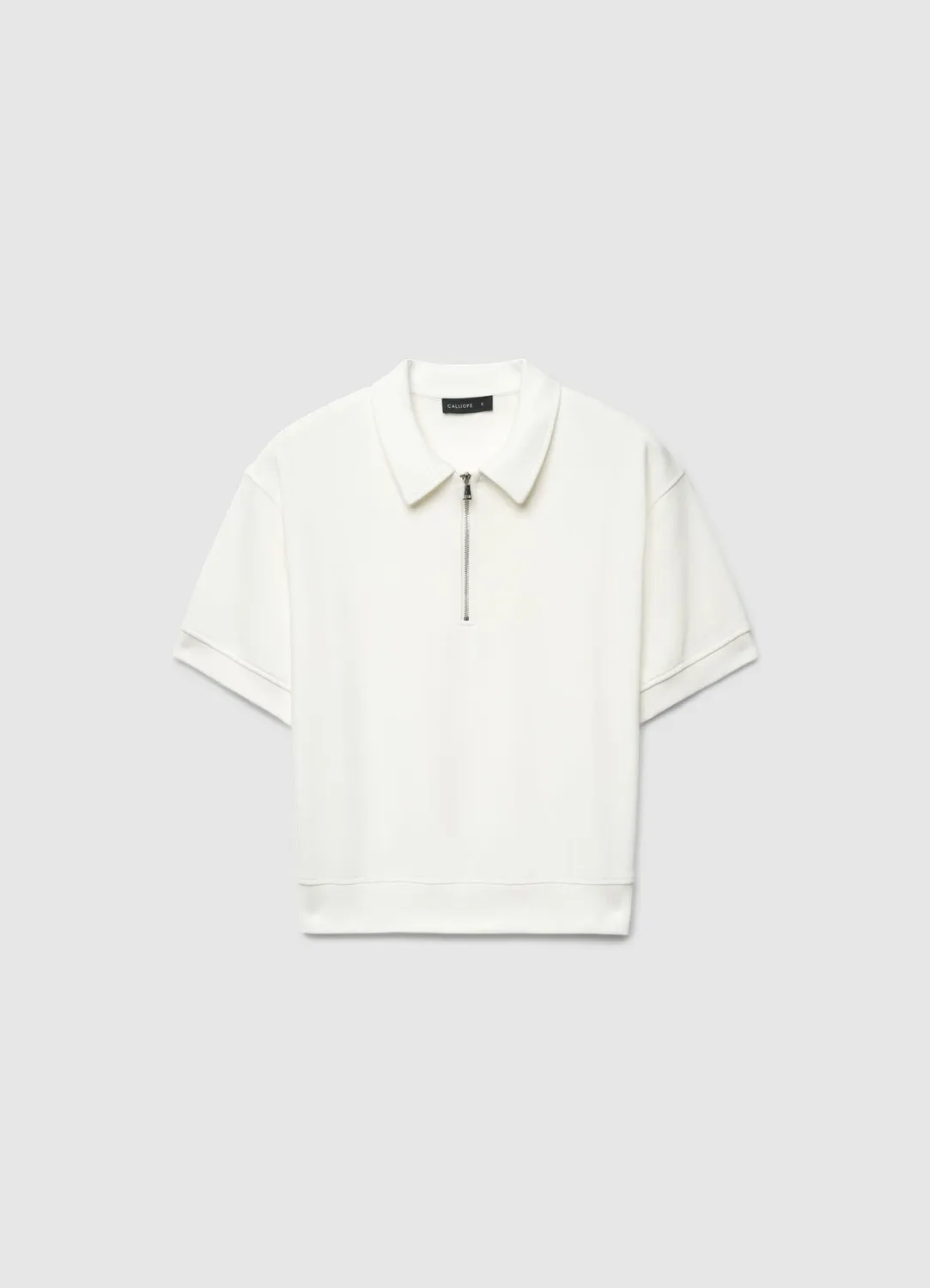 Calliope polo femme zippé manches courtes uni