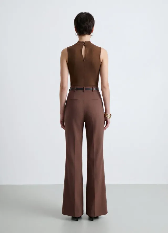 Calliope combinaison femme sans manches col montant