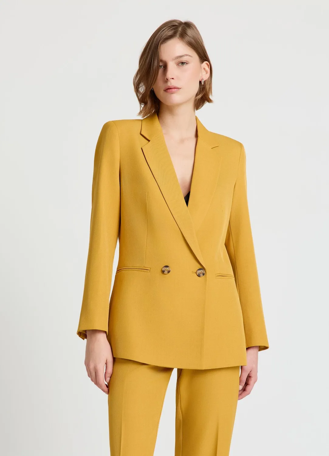 Calliope Deux Boutons veste double boutonnage femme