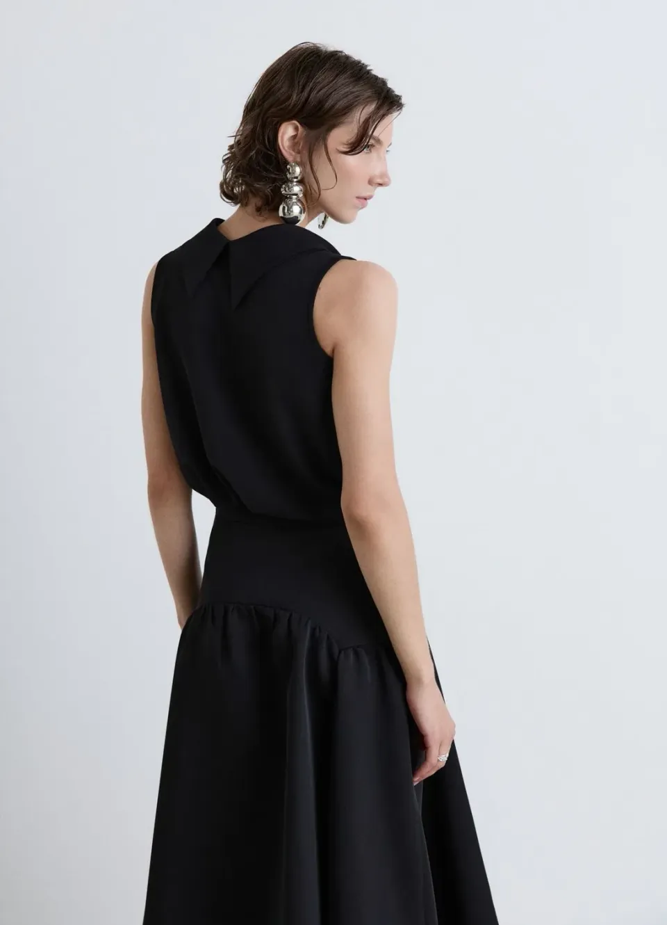 Calliope top femme col drapé sans manches uni