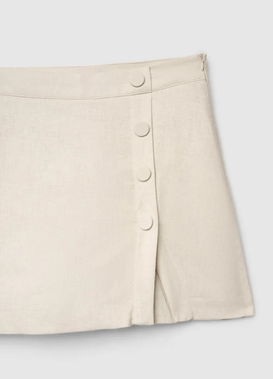 Calliope jupe-short boutons latéraux femme uni