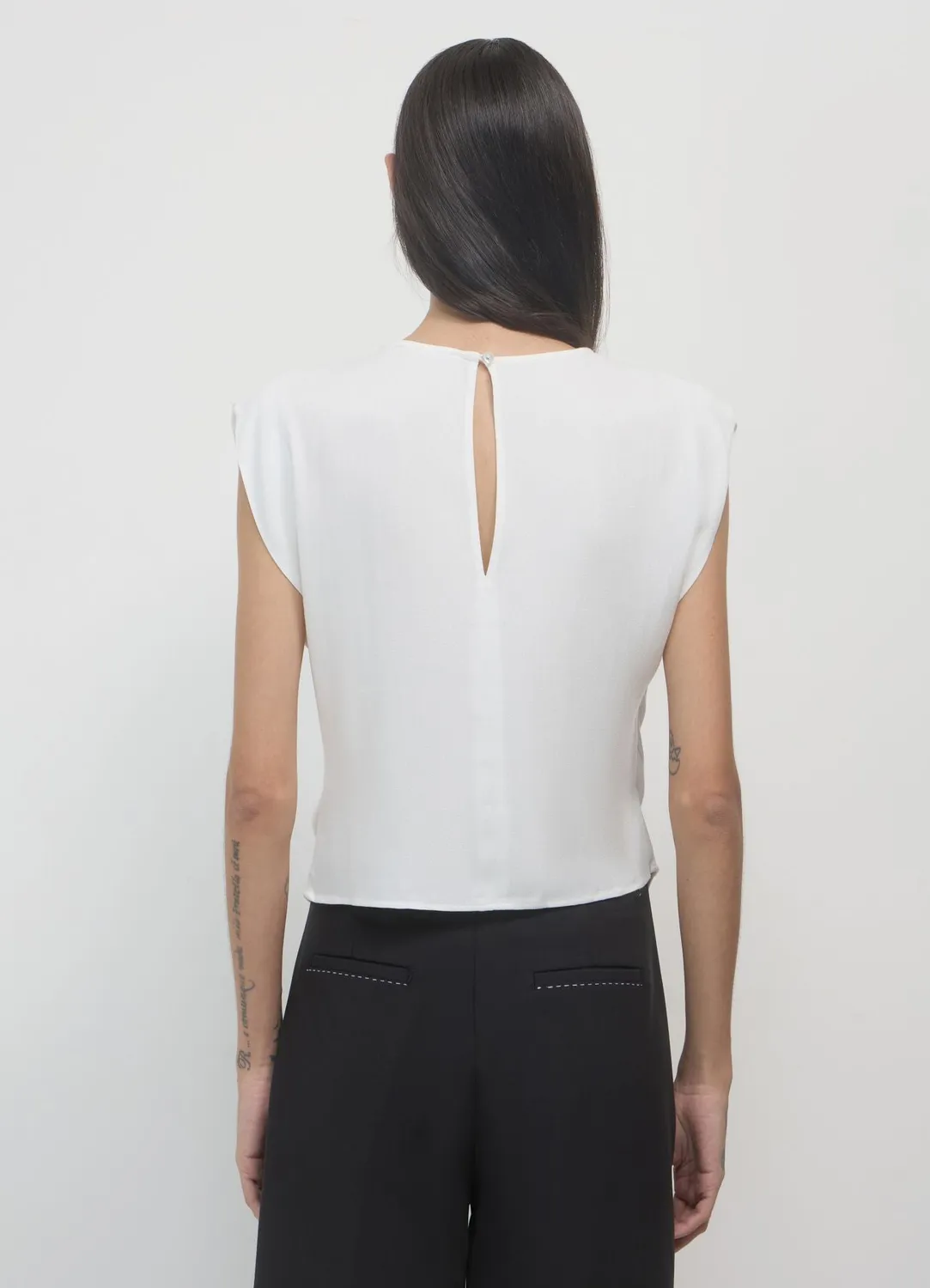 Calliope Pieghe blouse femme sans manches plissée